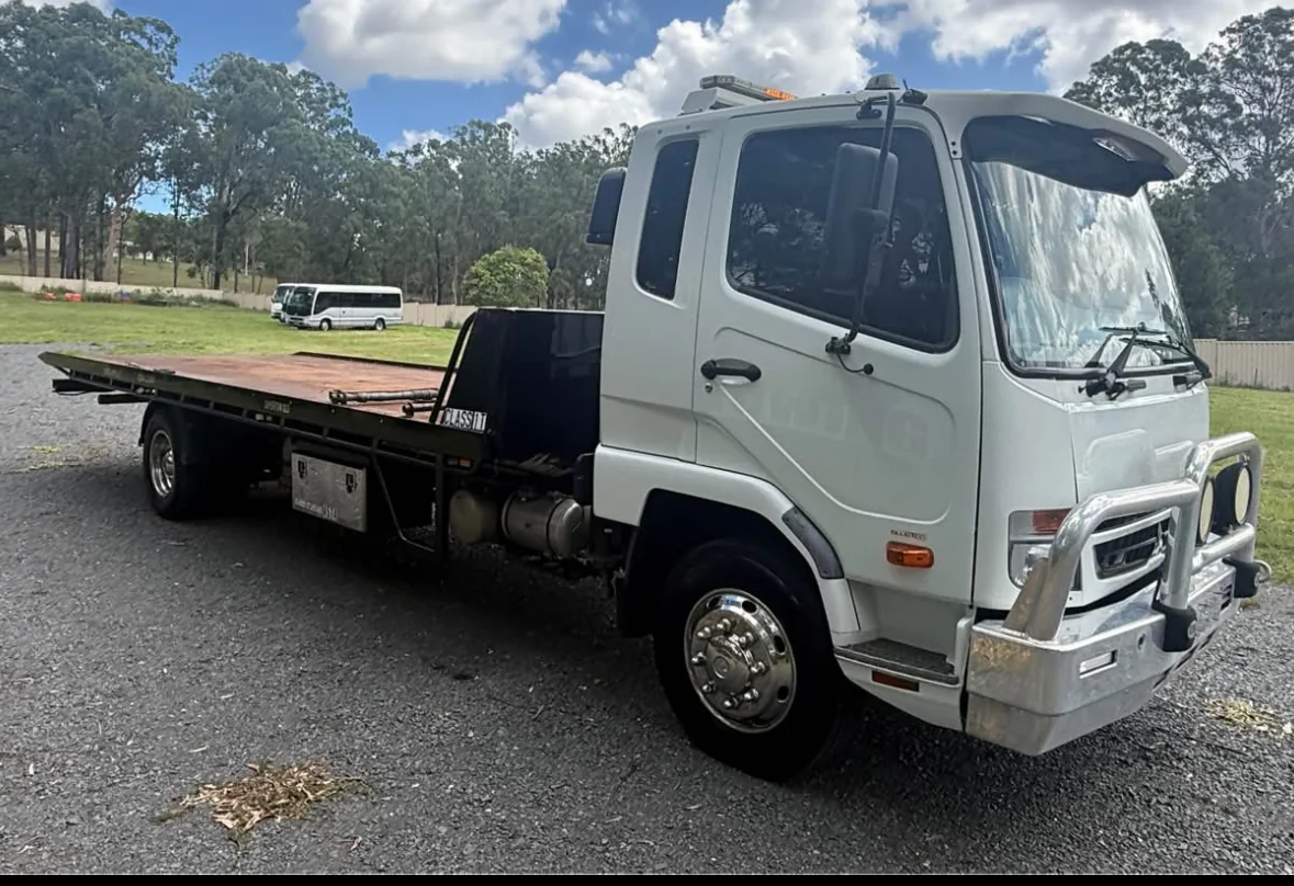 Mates Towing tilt tray tow truck